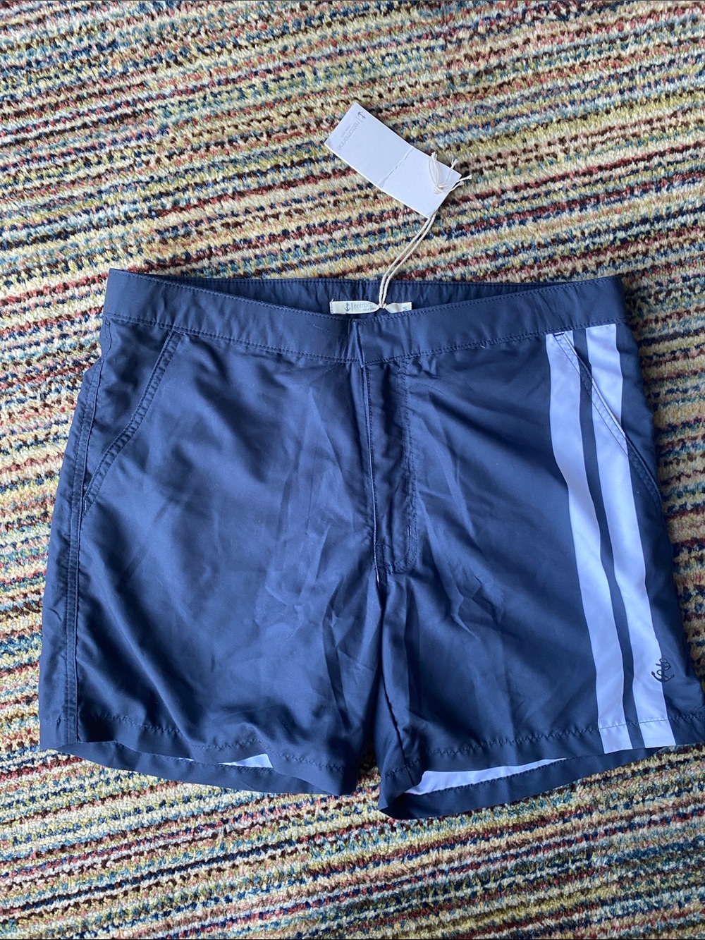 Retromarine navy swim trunks with white stripes